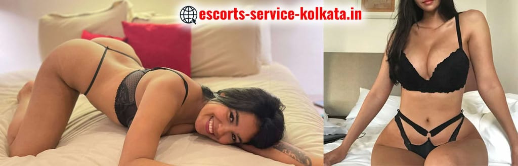 Gorgeous Howrah escort wearing black lingerie, lying on bed and posing seductively